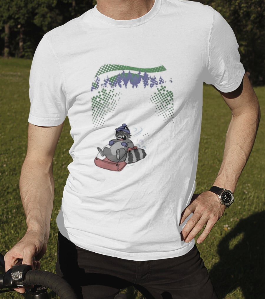 Raccoon Sledding In Winter Forest Scene With Evergreen Trees And Snowflakes T-Shirt