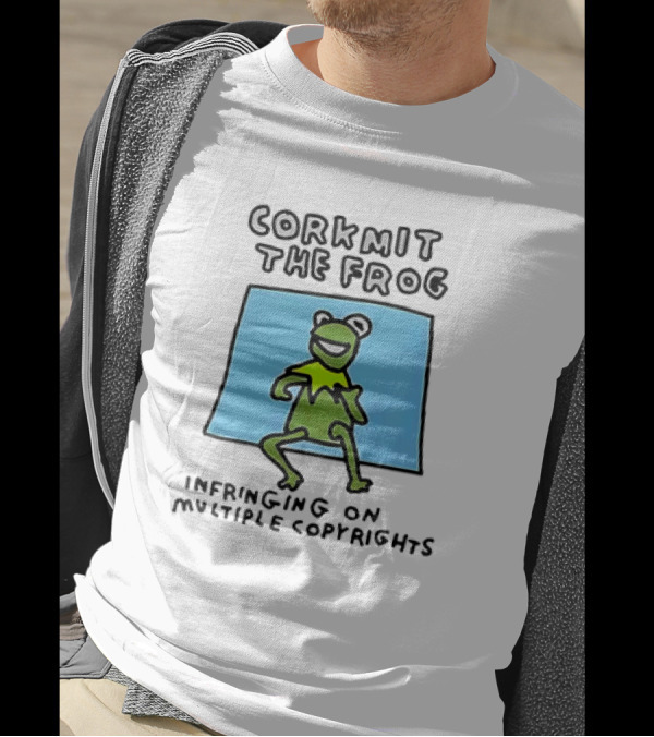 Corkmit The Frog Infringing On Multiple Copyrights Green Frog Cartoon With Blue Background T-Shirt