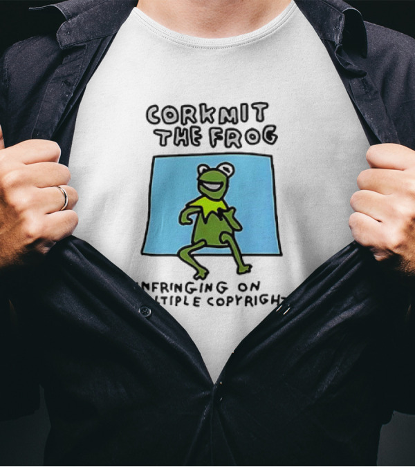 Corkmit The Frog Infringing On Multiple Copyrights Green Frog Cartoon With Blue Background T-Shirt