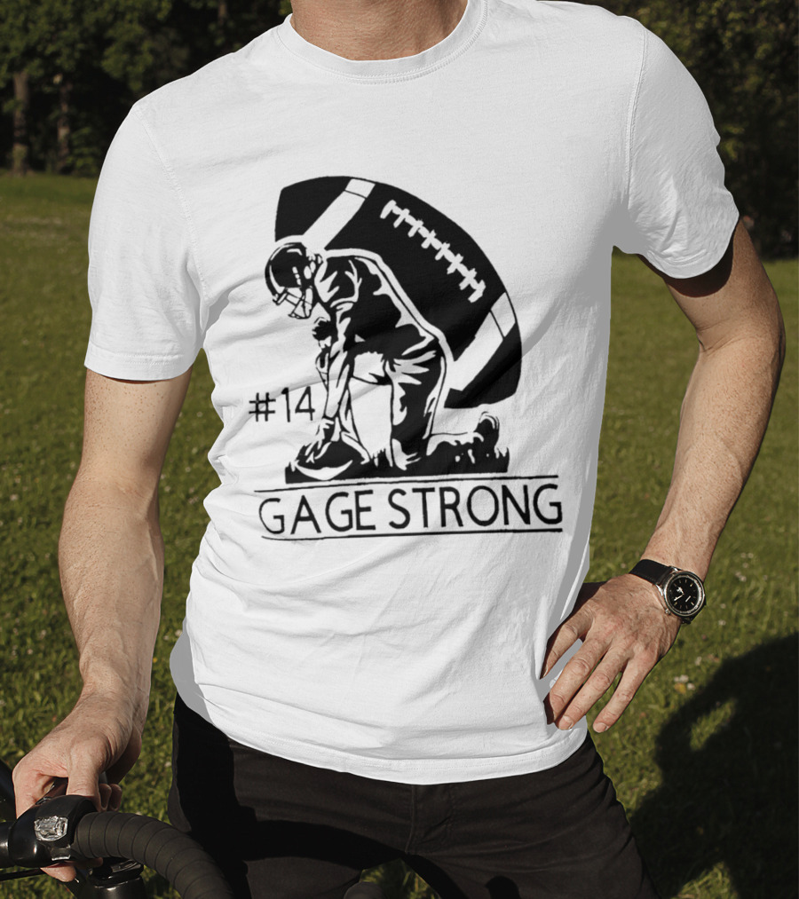 Gage Strong #14 Football Player Kneeling In Front Of Large Football T-Shirt