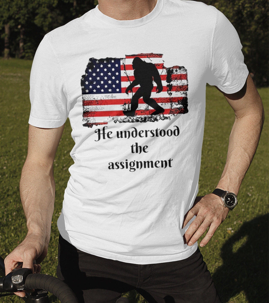 Bigfoot Silhouette With Distressed American Flag He Understood The Assignment T-Shirt