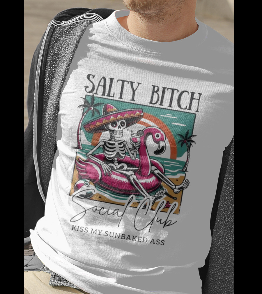 Salty Bitch Skeleton On Flamingo Float In Sunset Beach Scene With Kiss My Sunbaked Ass Text T-Shirt