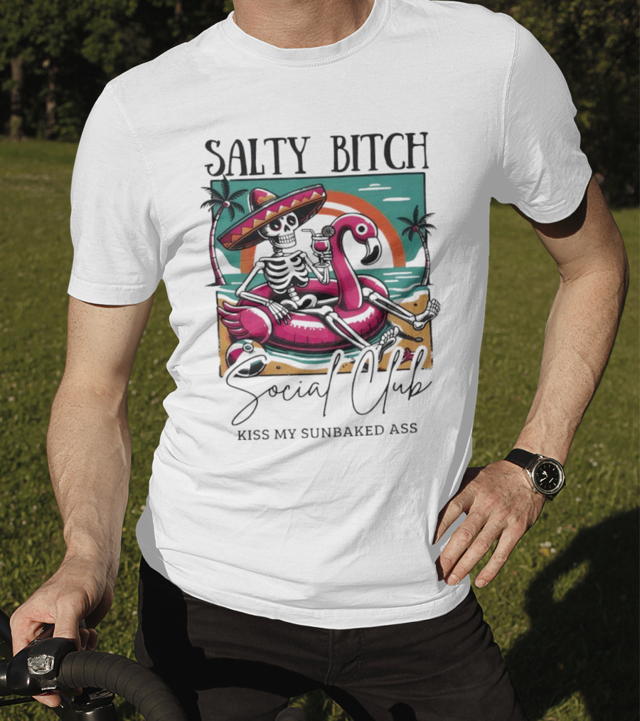 Salty Bitch Skeleton On Flamingo Float In Sunset Beach Scene With Kiss My Sunbaked Ass Text T-Shirt