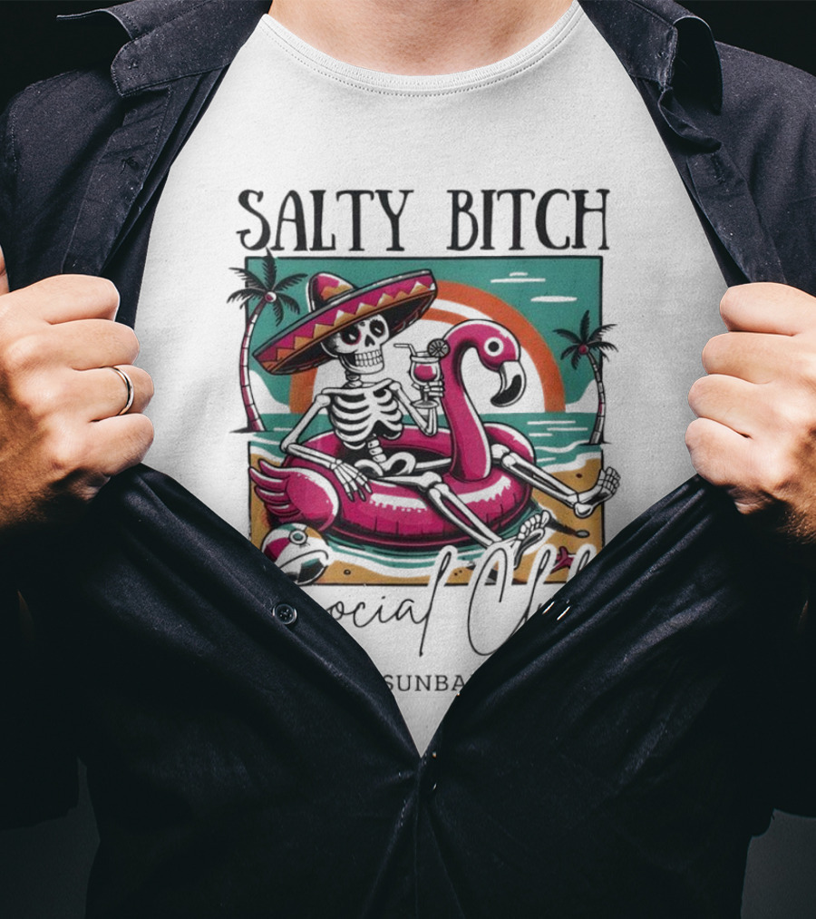 Salty Bitch Skeleton On Flamingo Float In Sunset Beach Scene With Kiss My Sunbaked Ass Text T-Shirt