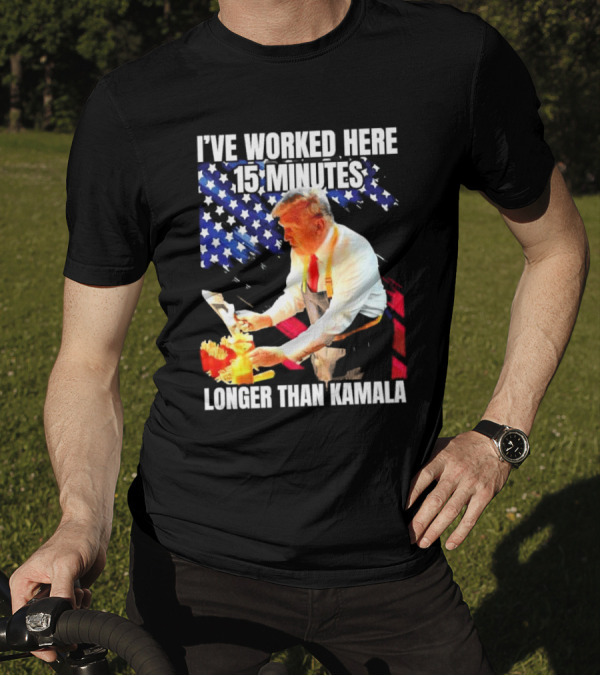 I’ve Worked Here 15 Minutes Longer Than Kamala Donald Trump American Flag Background T-Shirt