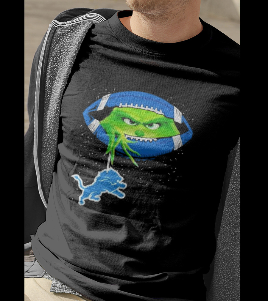 Grinch Holding Detroit Lions Logo Inside Football Christmas T-Shirt