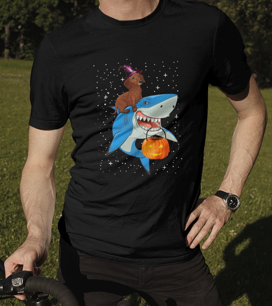Dachshund Witch On Shark Carrying Jack-o'-Lantern In Starry Halloween Sky T-Shirt