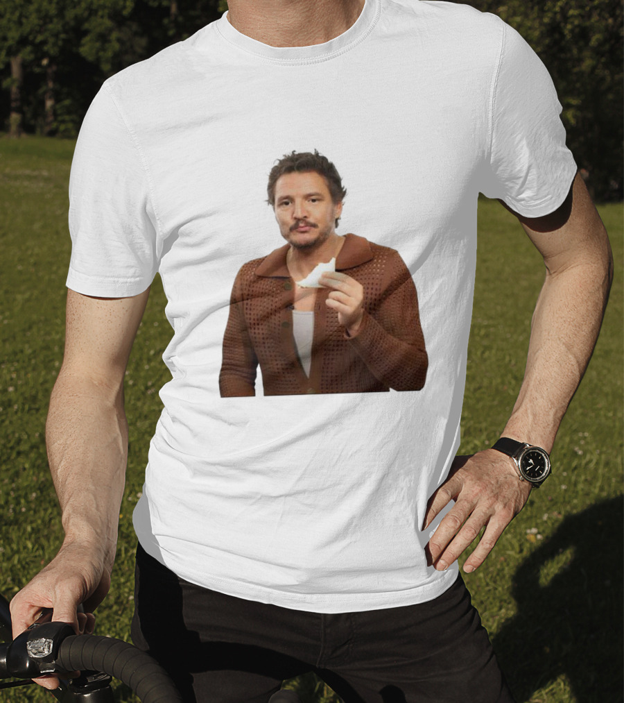 Pedro Pascal Holding Sandwich In Brown T-Shirt