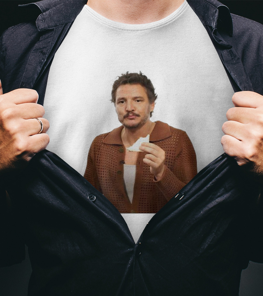 Pedro Pascal Holding Sandwich In Brown T-Shirt