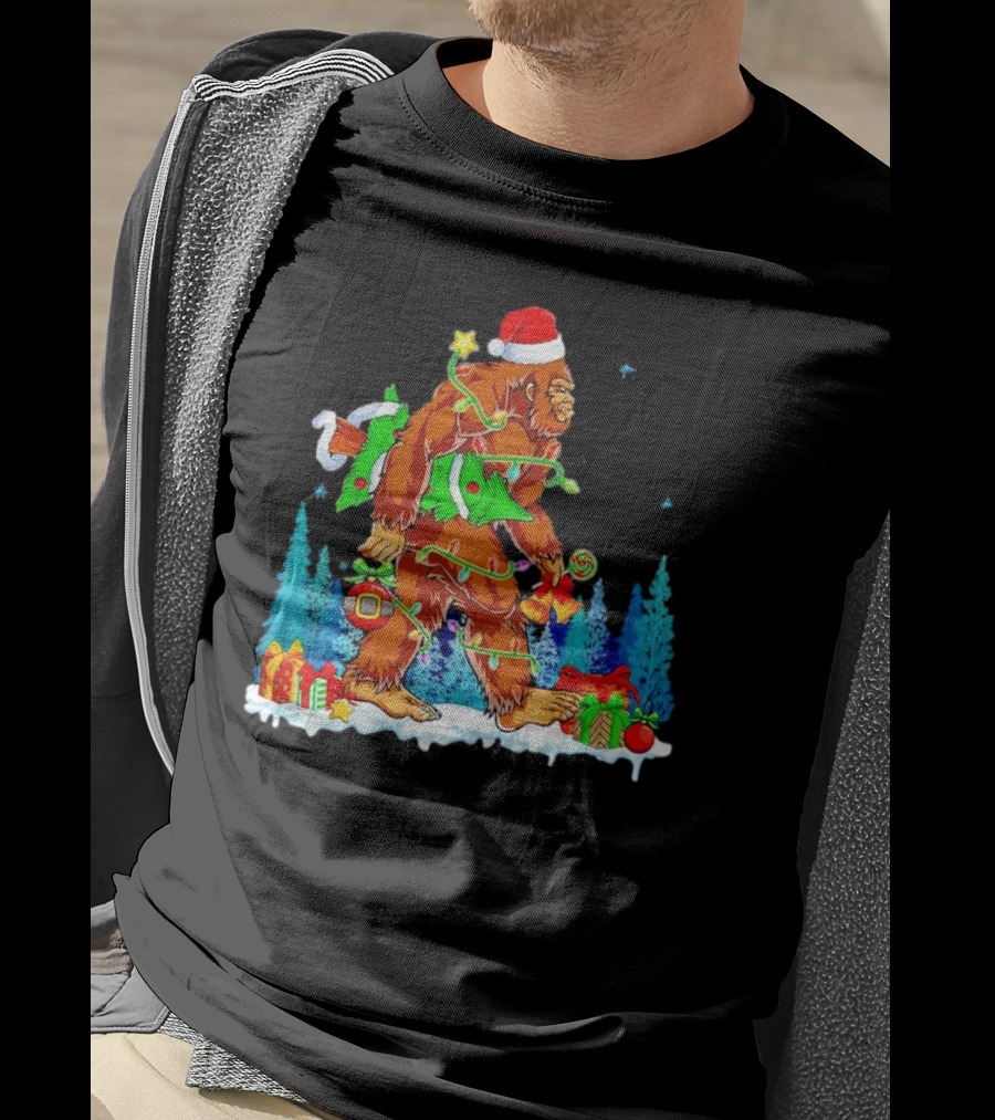 Bigfoot Santa Hugging Christmas Tree With Gifts And Snow Scene T-Shirt