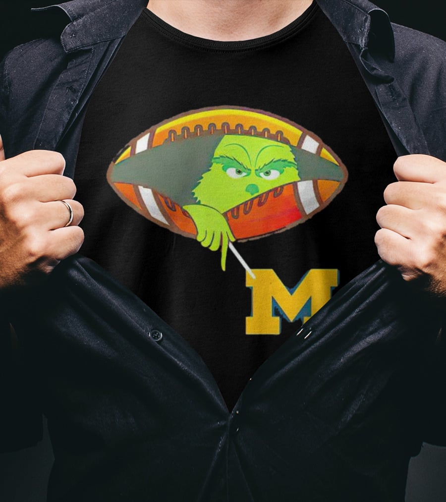 Grinch Peeking From Football Over Michigan Wolverines T-Shirt