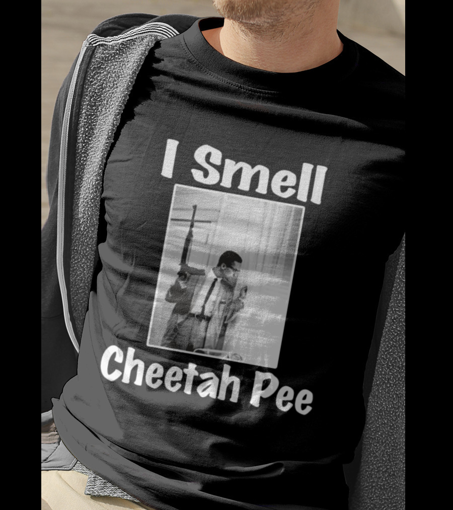 I Smell Cheetah Pee Man Holding Gun By Window T-Shirt