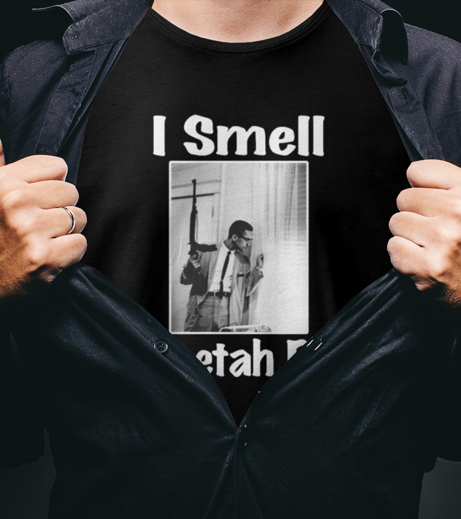 I Smell Cheetah Pee Man Holding Gun By Window T-Shirt