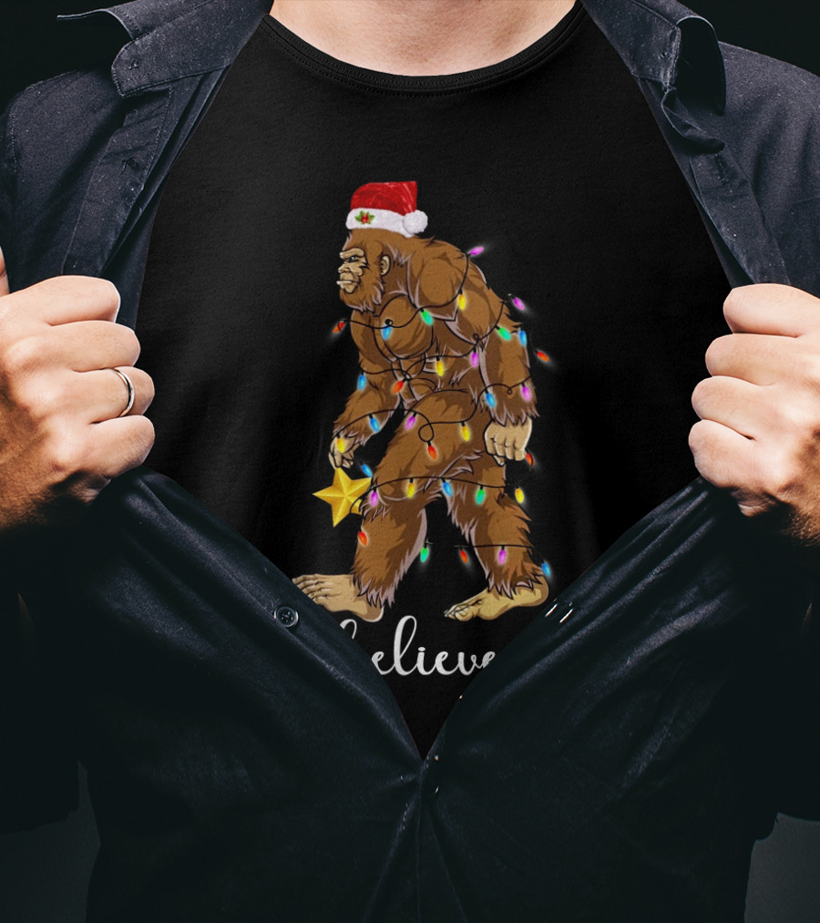 Bigfoot Christmas Lights Believe With Santa Hat And Star T-Shirt
