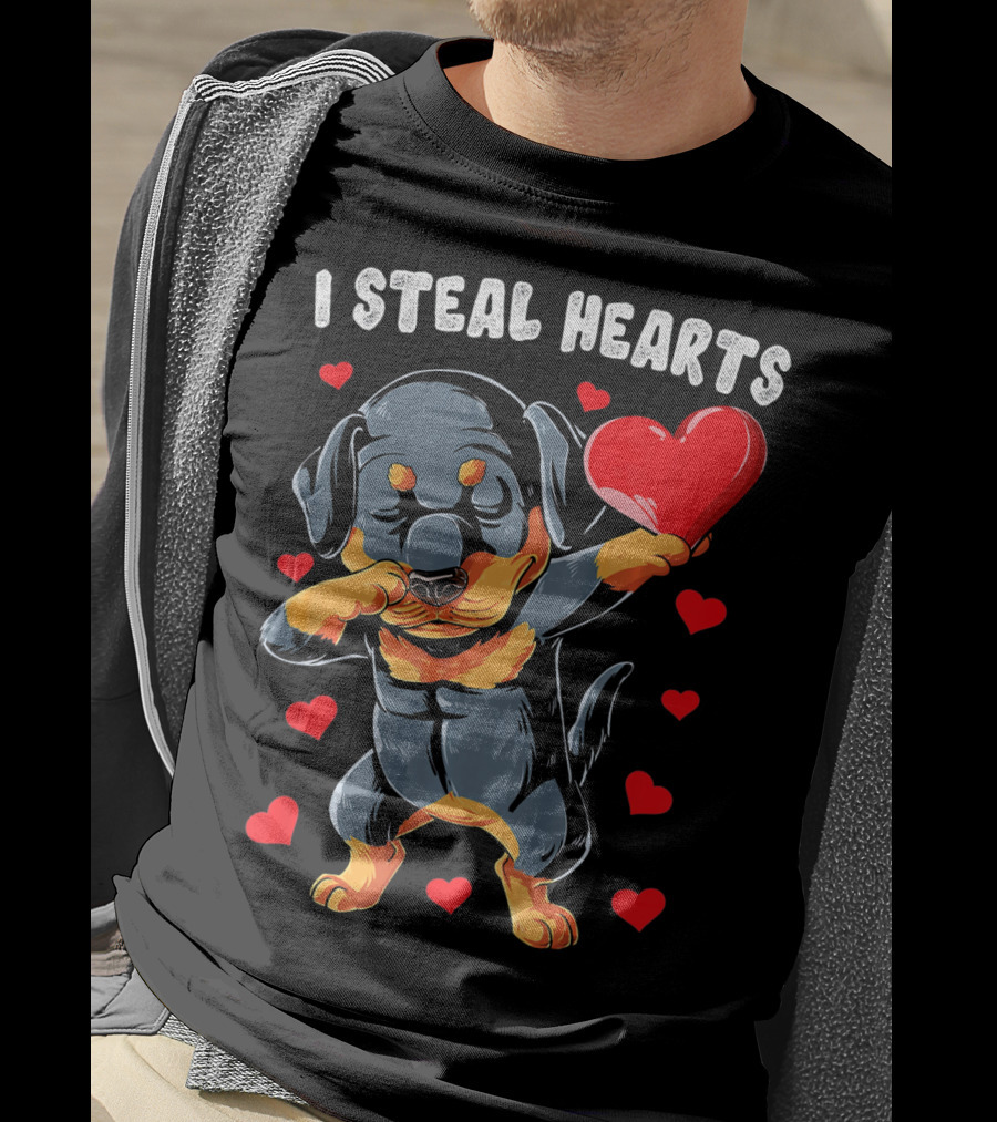 Dabbing Rottweiler Holding Heart Surrounded By I Steal Hearts Text T-Shirt
