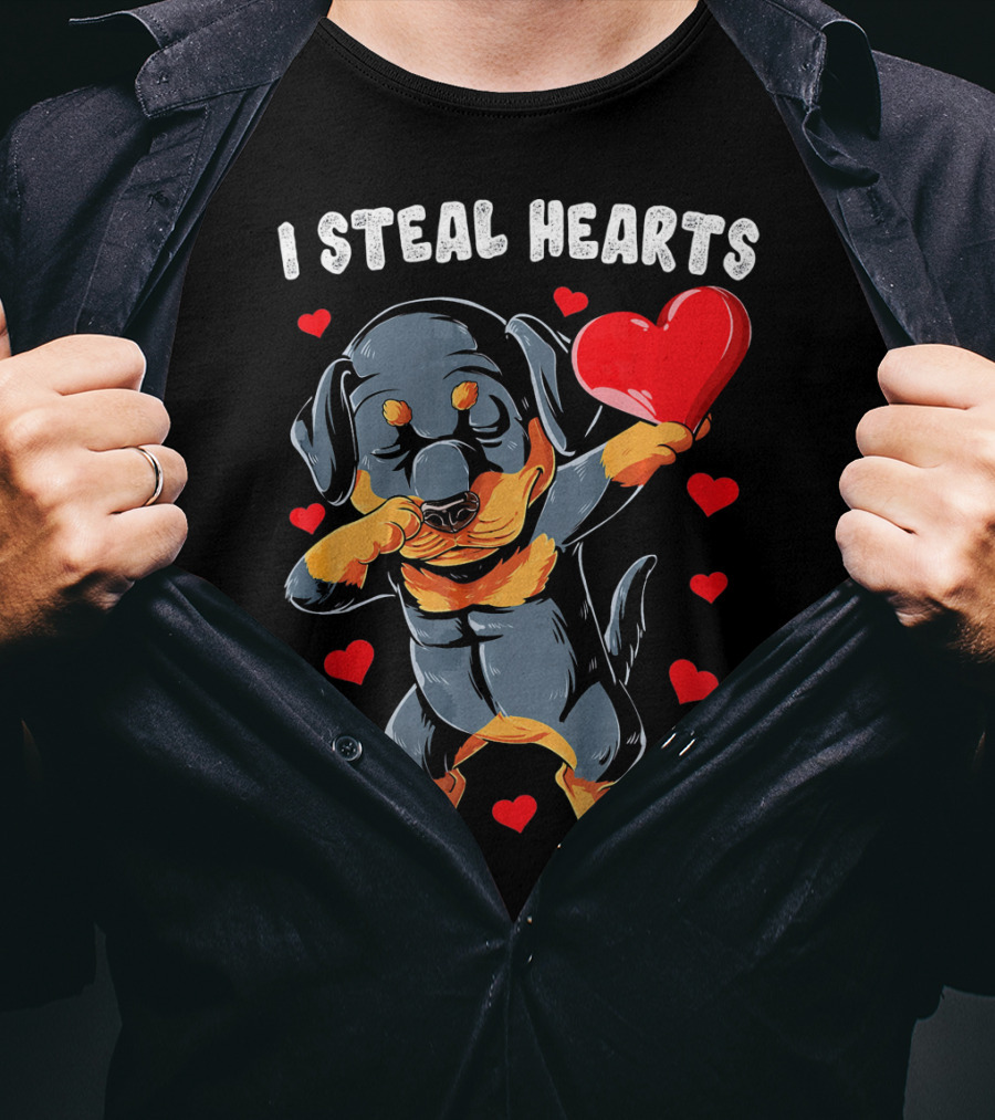 Dabbing Rottweiler Holding Heart Surrounded By I Steal Hearts Text T-Shirt