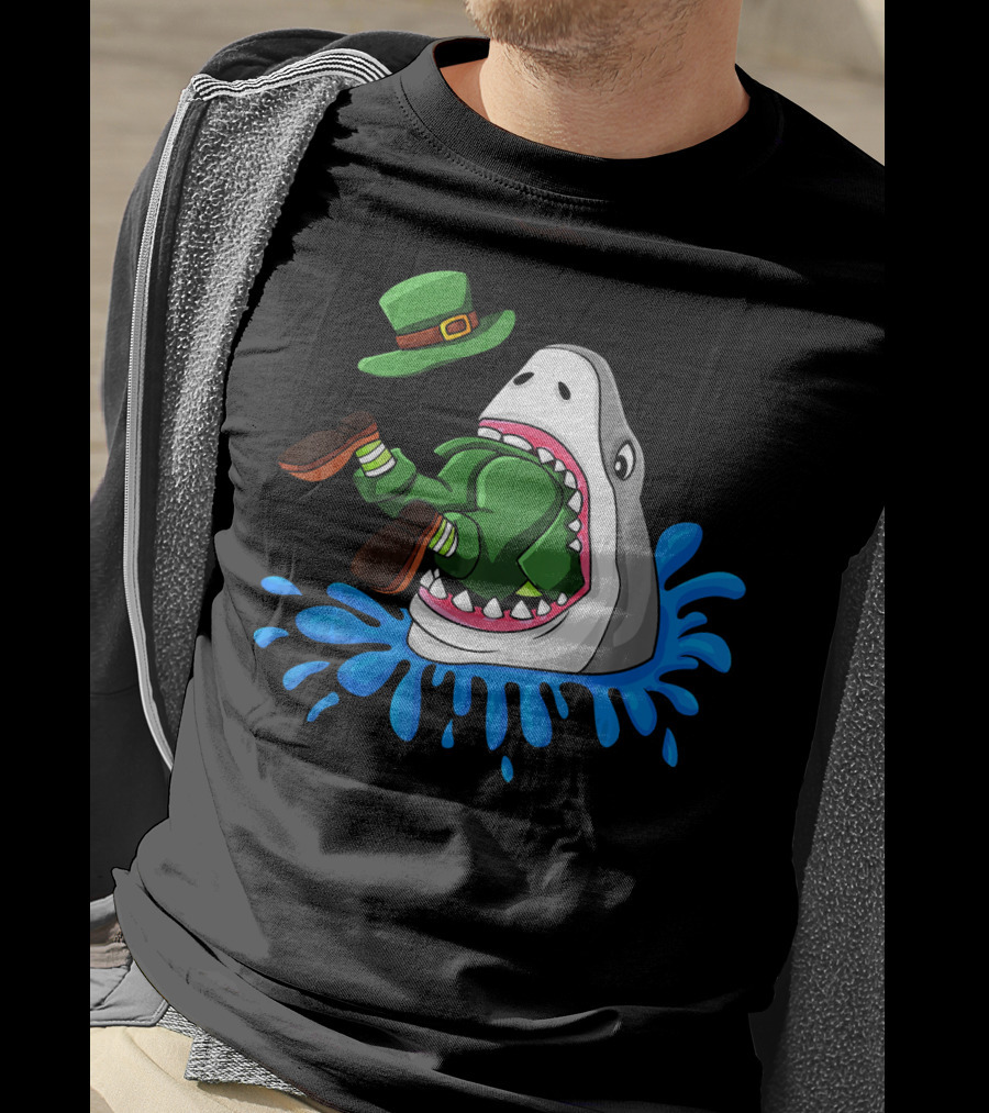 Shark Devours Leprechaun Wearing Green Outfit With Dropped Hat In Water Splash T-Shirt