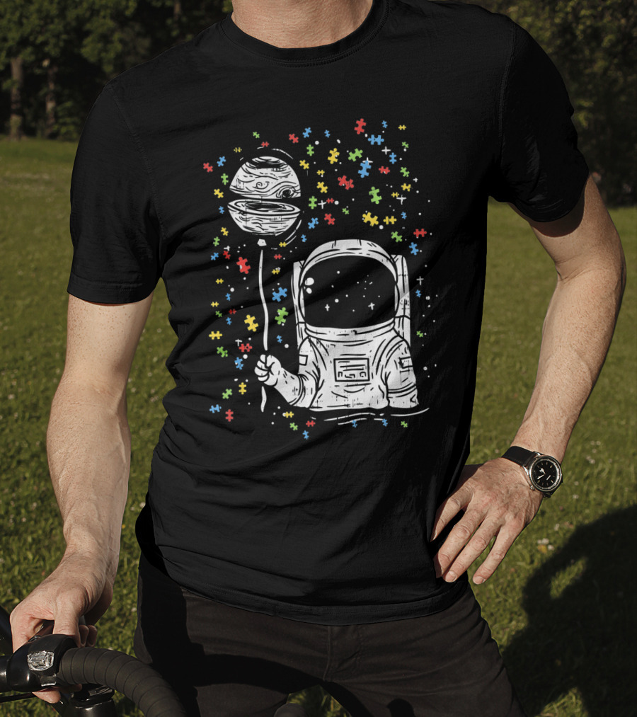 Astronaut Holding Planet Balloon With Puzzle Pieces For Autism Awareness T-Shirt