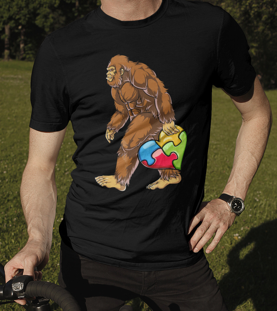 Bigfoot Holding Puzzle Piece Heart Autism Awareness T-Shirt
