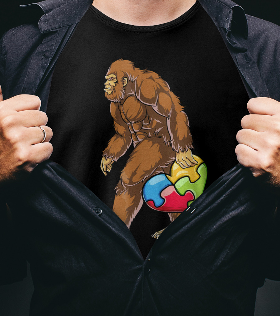 Bigfoot Holding Puzzle Piece Heart Autism Awareness T-Shirt