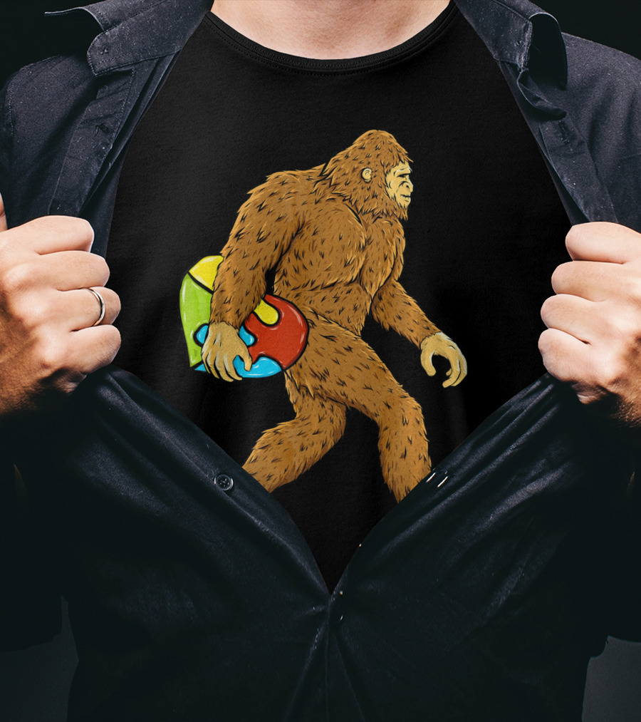 Autism Awareness Bigfoot Carrying Puzzle Heart T-Shirt