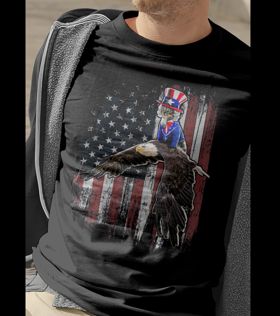 Uncle Sam Costume Cat Riding Bald Eagle On American Flag Background T-Shirt