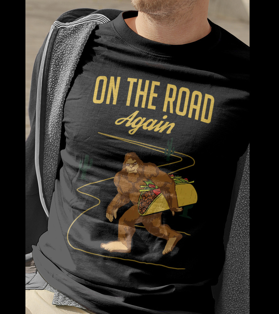 ON THE ROAD AGAIN Smirk Bigfoot Sasquatch Carrying Taco T-Shirt