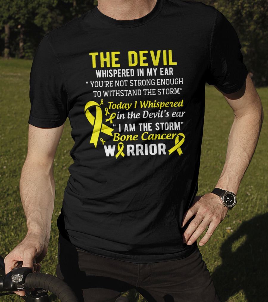 The Devil Whispered You’re Not Strong Enough To Withstand The Storm I Am The Storm Bone Cancer Warrior Yellow T-Shirt