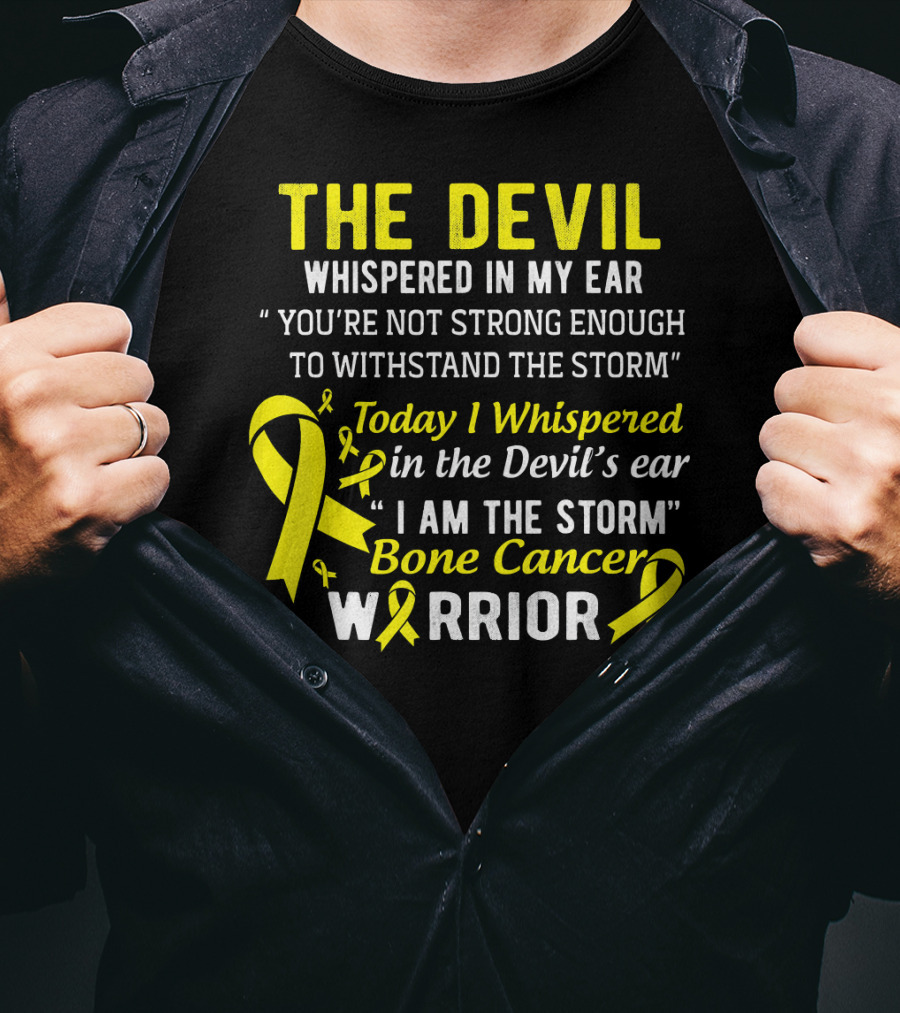 The Devil Whispered You’re Not Strong Enough To Withstand The Storm I Am The Storm Bone Cancer Warrior Yellow T-Shirt