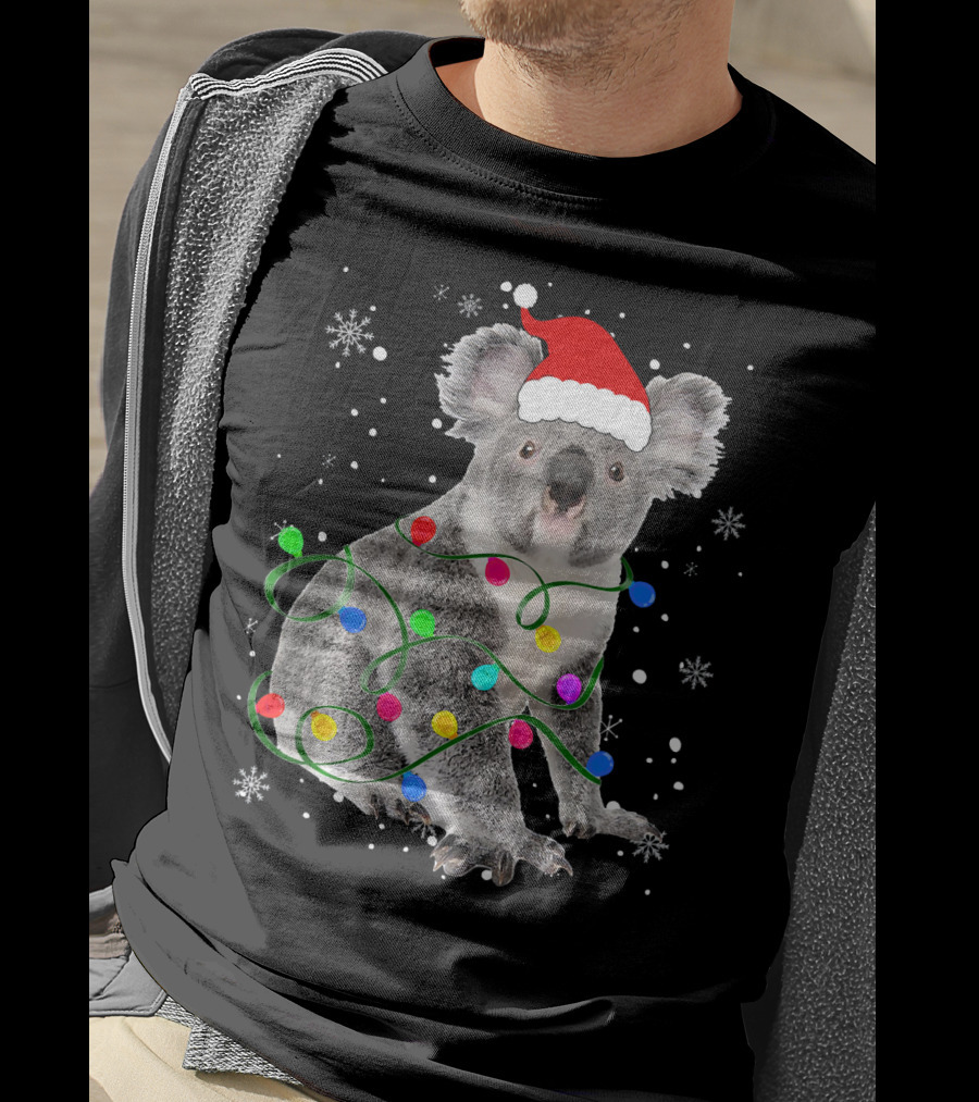 Koala Wrapped In Christmas Lights Wearing Santa Hat With Snowflakes Matching Fam T-Shirt