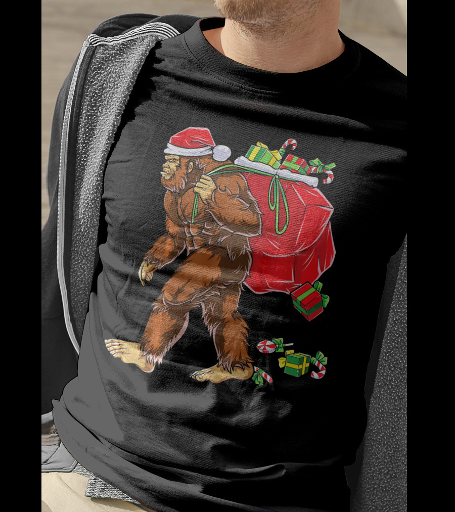 Bigfoot Santa Carrying Gifts With Candy Canes T-Shirt