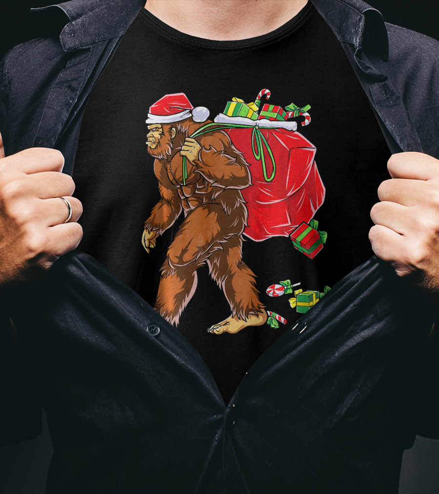 Bigfoot Santa Carrying Gifts With Candy Canes T-Shirt