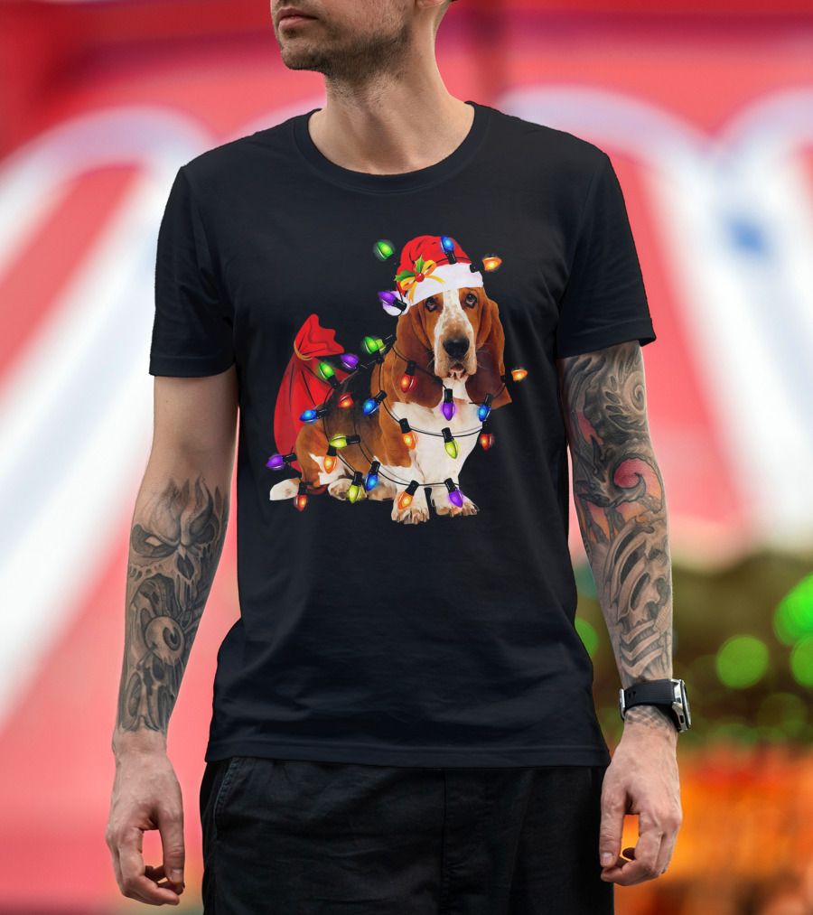 Basset Hound Wrapped in Christmas Lights with Santa Hat and Red Sack T-Shirt