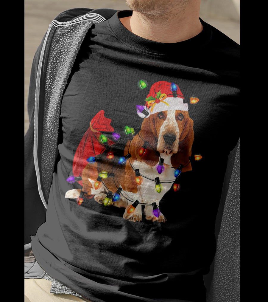 Basset Hound Wrapped In Christmas Lights With Santa Hat And Red Sack T-Shirt