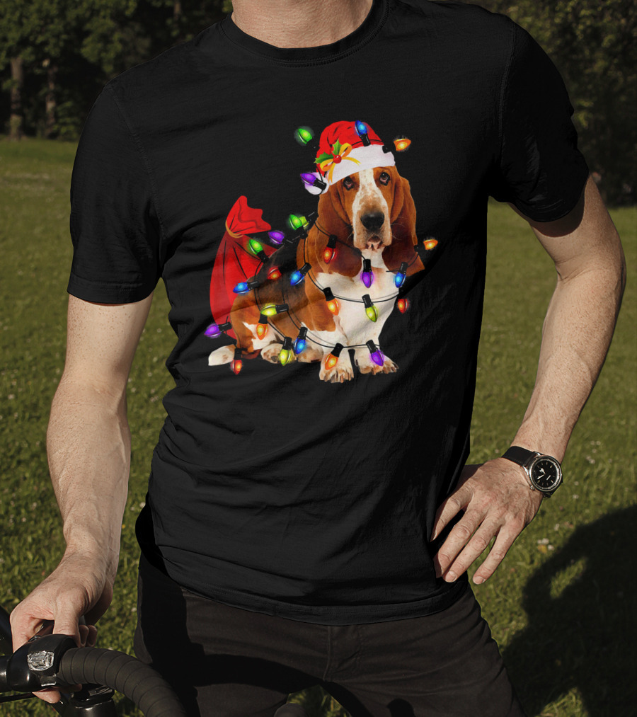 Basset Hound Wrapped In Christmas Lights With Santa Hat And Red Sack T-Shirt