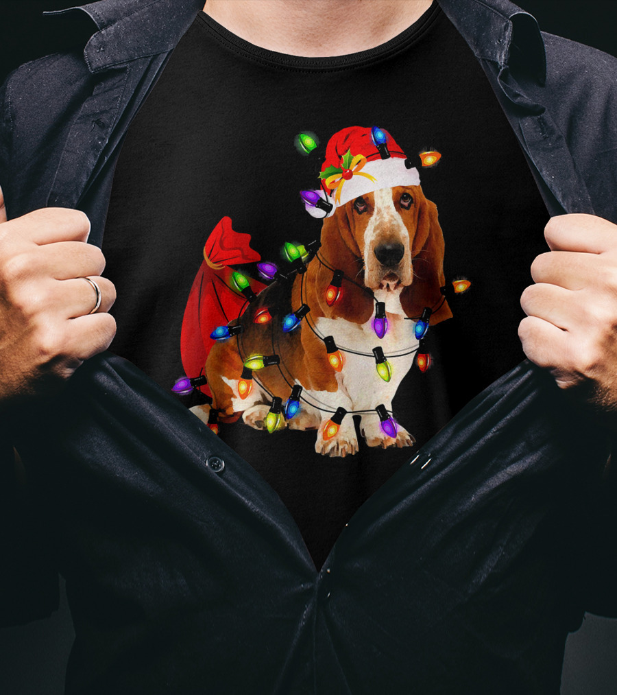 Basset Hound Wrapped In Christmas Lights With Santa Hat And Red Sack T-Shirt