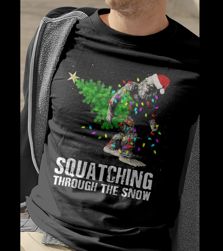 Squatching Through The Snow Bigfoot Christmas Lights Santa Hat T-Shirt
