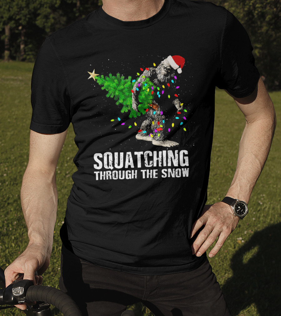 Squatching Through The Snow Bigfoot Christmas Lights Santa Hat T-Shirt