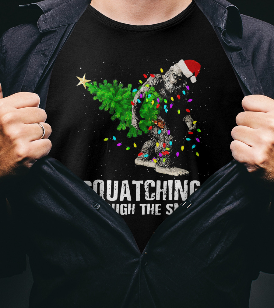 Squatching Through The Snow Bigfoot Christmas Lights Santa Hat T-Shirt