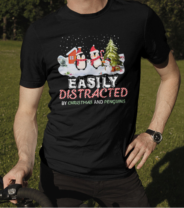 Easily Distracted By Christmas And Penguins In Winter Wonderland With Snowman House And Tree T-Shirt