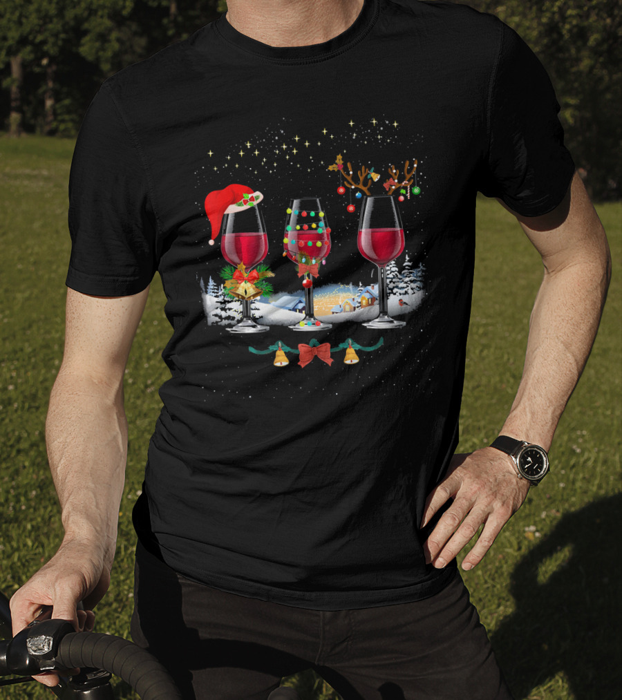 Three Christmas Red Wine Glasses Santa Hat Reindeer Lights Snowy Village T-Shirt