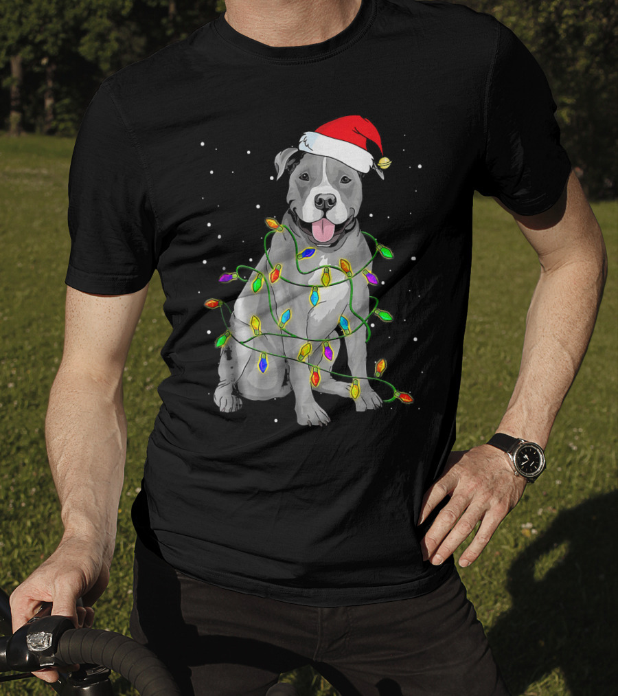 Pitbull In Santa Hat Wrapped In Christmas Lights With Snowy Background T-Shirt