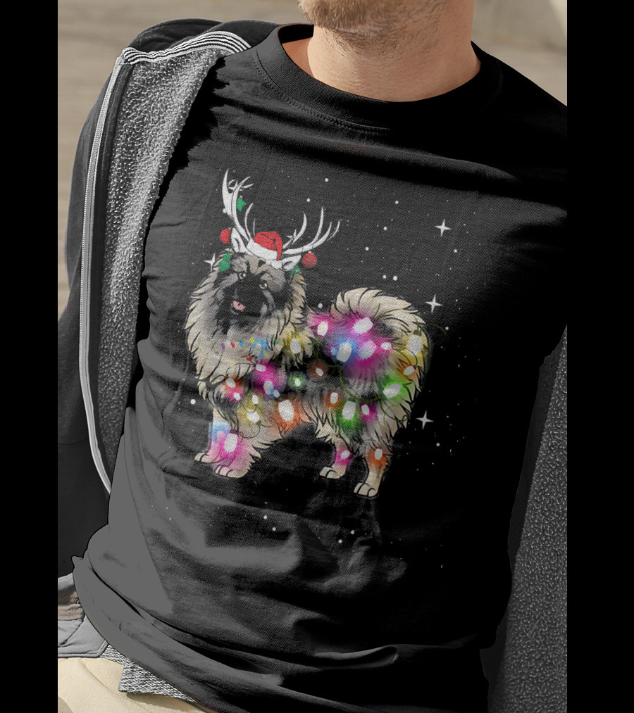Keeshond Dog Wrapped In Christmas Lights Wearing Red Santa Hat And Antlers T-Shirt