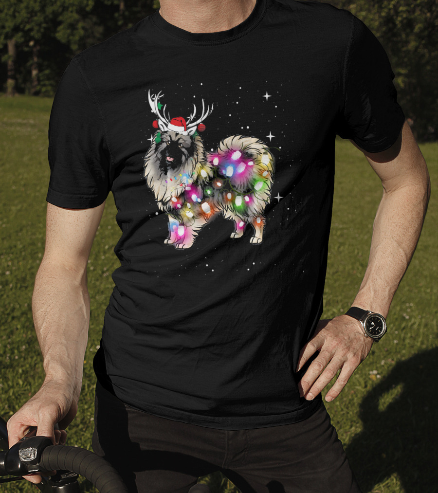 Keeshond Dog Wrapped In Christmas Lights Wearing Red Santa Hat And Antlers T-Shirt