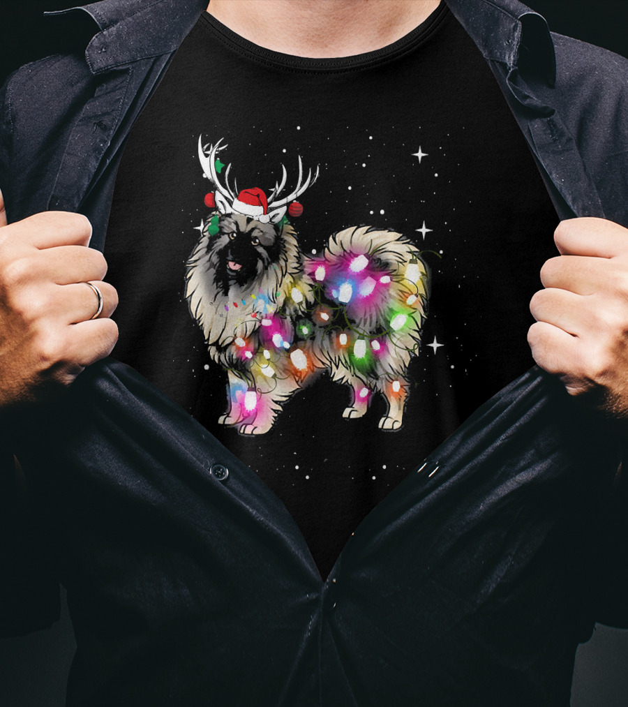 Keeshond Dog Wrapped In Christmas Lights Wearing Red Santa Hat And Antlers T-Shirt