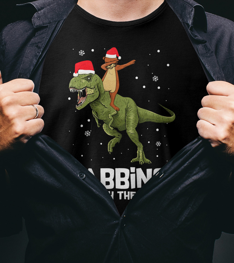 Dabbing Through The Snow Otter Rides Dinosaur Santa Hats T-Shirt
