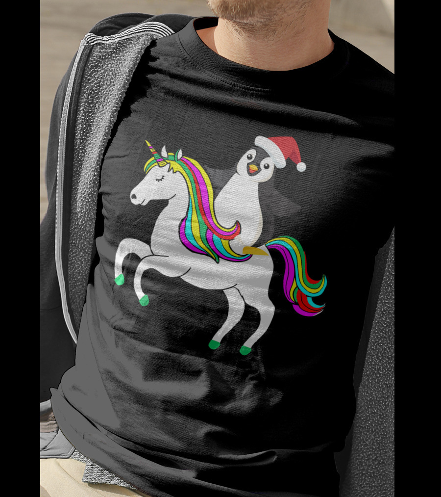 Penguin In Santa Hat Riding A Rainbow Unicorn T-Shirt