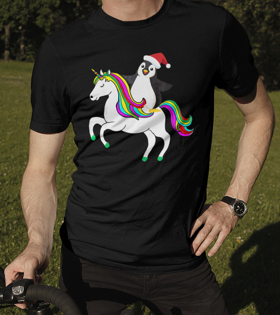 Penguin In Santa Hat Riding A Rainbow Unicorn T-Shirt